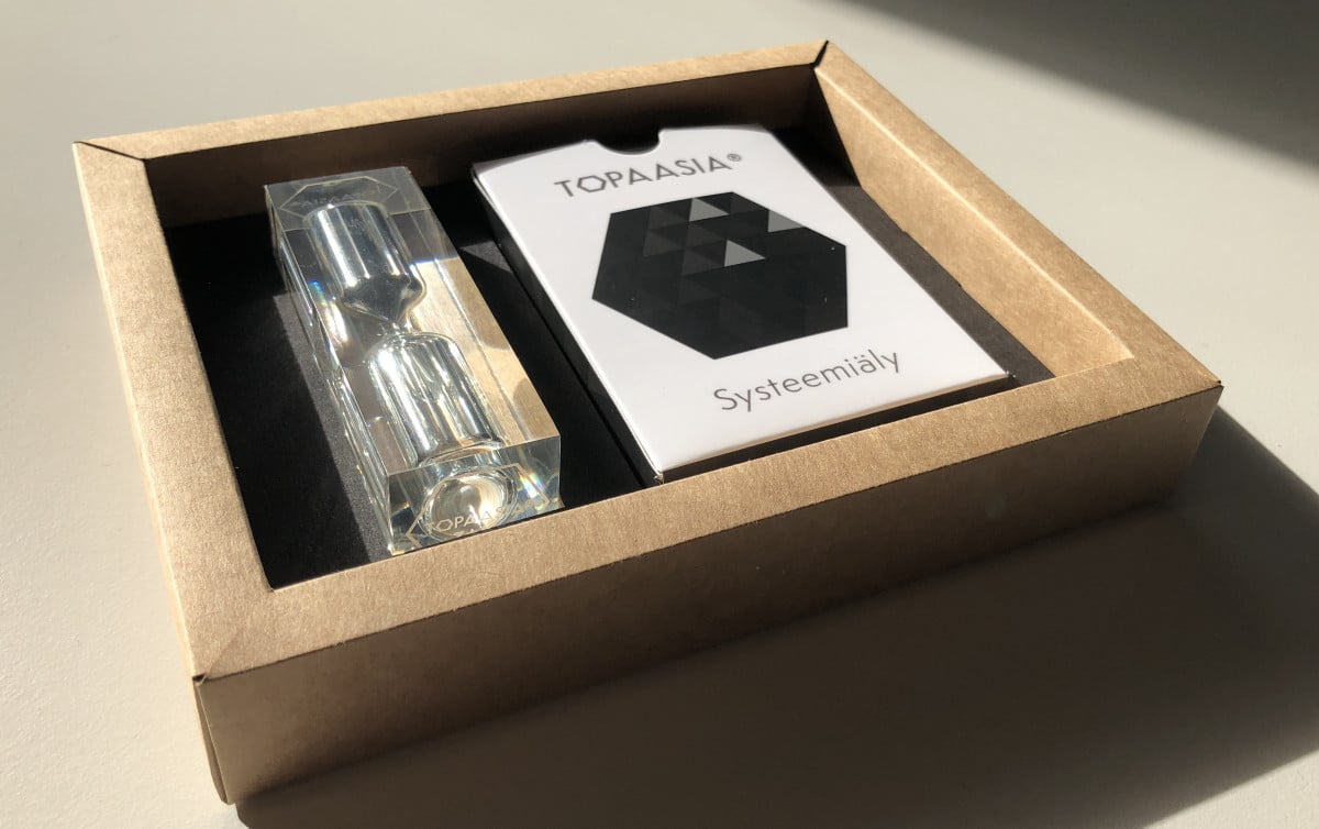The physical Topaasia: Systems Intelligence card game in its packaging
